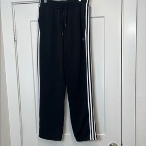 Adidas Black Track Pants with White Stripes size large. In excellent condition!